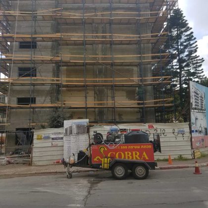 ניקוי צבע מחזית בניין